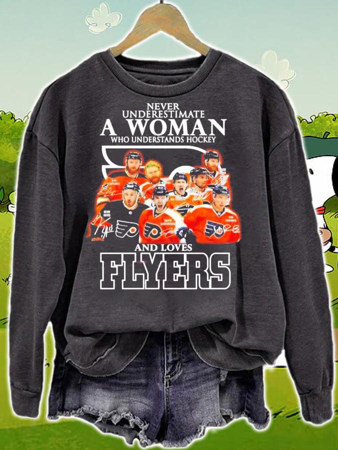 Never underestimate a woman who understands hockey and loves Flyers t-shirt sweatshirt
